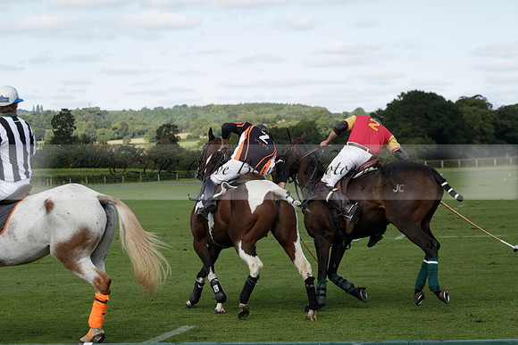Four Quarters Black (black) v BHC (red) in a Autumn Cup polo match on Ambersham 2 at Cowdray Park Polo Club on Friday 20 September 2013 www.polopictures.co.uk