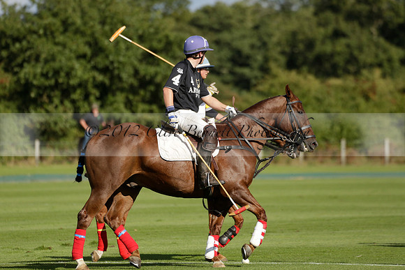 Aryana (black) v Shoreline (yellow) in a Farewell Cup polo match played on Ambersham 5 at Cowdray Park Polo Club on Wednesday 18 September 2013. www.polopictures.co.uk