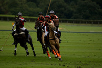 Four Quarters Black (black) v Clashleigh (red)in a Jaeger Le Coultre Autumn Cup polo match played on Ambersham 2 at Cowdray Park Polo Club on Wednesday 2013.09.11 www.polopictures.co.uk