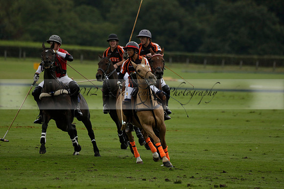 Four Quarters Black (black) v Clashleigh (red)in a Jaeger Le Coultre Autumn Cup polo match played on Ambersham 2 at Cowdray Park Polo Club on Wednesday 2013.09.11 www.polopictures.co.uk