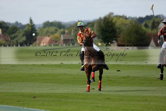 Four Quarters Black (black) v BHC (red) in a Autumn Cup polo match on Ambersham 2 at Cowdray Park Polo Club on Friday 20 September 2013 www.polopictures.co.uk