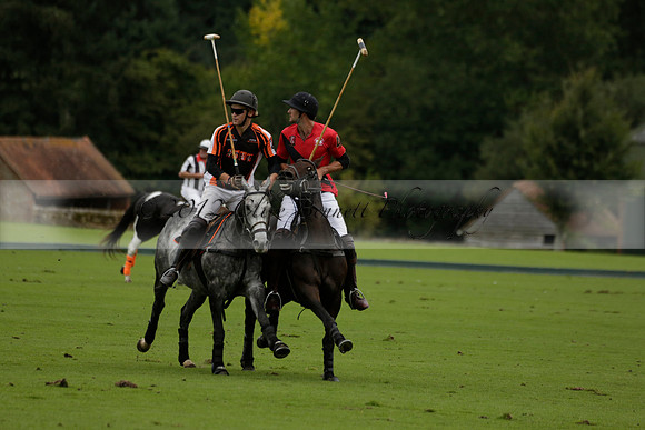 Four Quarters Black (black) v Clashleigh (red) in the Autumn Cup subsidiary final polo match on Ambersham 2 at Cowdray Park Polo Club on Sunday 22 September 2013 www.polopictures.co.uk