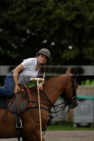 Four Quarters Black (black) v Clashleigh (red) in the Autumn Cup subsidiary final polo match on Ambersham 2 at Cowdray Park Polo Club on Sunday 22 September 2013 www.polopictures.co.uk