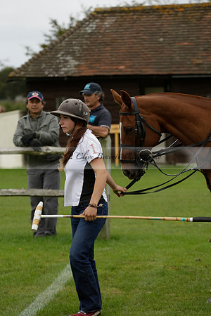 Four Quarters Black (black) v Clashleigh (red) in the Autumn Cup subsidiary final polo match on Ambersham 2 at Cowdray Park Polo Club on Sunday 22 September 2013 www.polopictures.co.uk