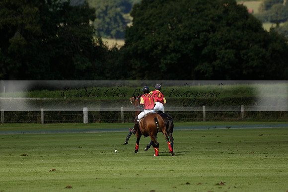 Four Quarters Black (black) v BHC (red) in a Autumn Cup polo match on Ambersham 2 at Cowdray Park Polo Club on Friday 20 September 2013 www.polopictures.co.uk