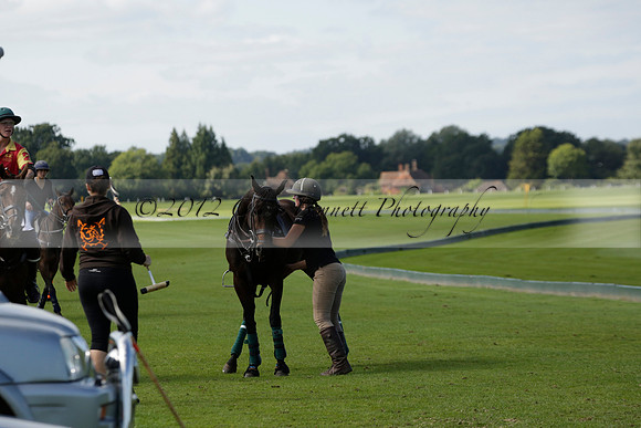Four Quarters Black (black) v BHC (red) in a Autumn Cup polo match on Ambersham 2 at Cowdray Park Polo Club on Friday 20 September 2013 www.polopictures.co.uk