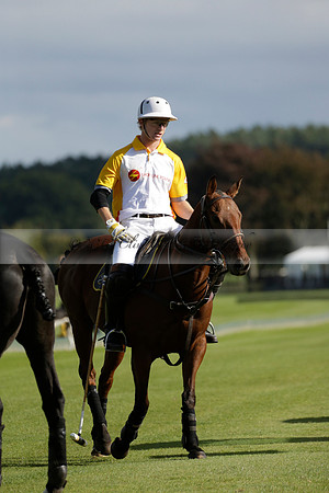 Aryana (black) v Shoreline (yellow) in a Farewell Cup polo match played on Ambersham 5 at Cowdray Park Polo Club on Wednesday 18 September 2013. www.polopictures.co.uk