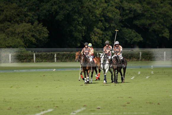 Four Quarters Black (black) v BHC (red) in a Autumn Cup polo match on Ambersham 2 at Cowdray Park Polo Club on Friday 20 September 2013 www.polopictures.co.uk