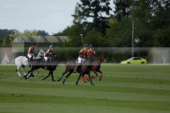 Four Quarters Black (black) v BHC (red) in a Autumn Cup polo match on Ambersham 2 at Cowdray Park Polo Club on Friday 20 September 2013 www.polopictures.co.uk