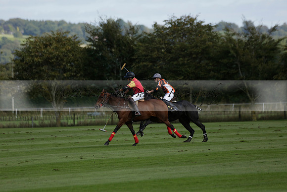 Four Quarters Black (black) v BHC (red) in a Autumn Cup polo match on Ambersham 2 at Cowdray Park Polo Club on Friday 20 September 2013 www.polopictures.co.uk