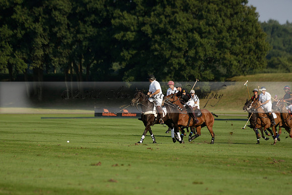Pluma Negra (white) v Shoreline (black) in the Brecknock Cup Subsidiary final polo match played on Sunday 25 August 2013 at Cowdray Park Polo Club on Ambersham 1. 2013.10.12 www.polopictures.co.uk