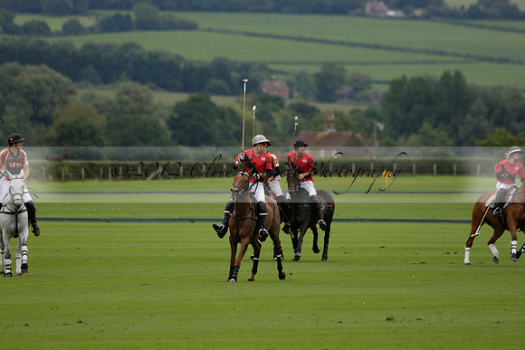 Four Quarters Black (black) v Clashleigh (red) in the Autumn Cup subsidiary final polo match on Ambersham 2 at Cowdray Park Polo Club on Sunday 22 September 2013 www.polopictures.co.uk