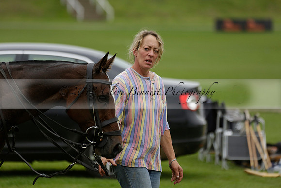 Four Quarters Black (black) v Clashleigh (red) in the Autumn Cup subsidiary final polo match on Ambersham 2 at Cowdray Park Polo Club on Sunday 22 September 2013 www.polopictures.co.uk