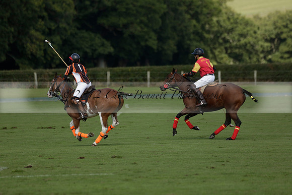 Four Quarters Black (black) v BHC (red) in a Autumn Cup polo match on Ambersham 2 at Cowdray Park Polo Club on Friday 20 September 2013 www.polopictures.co.uk