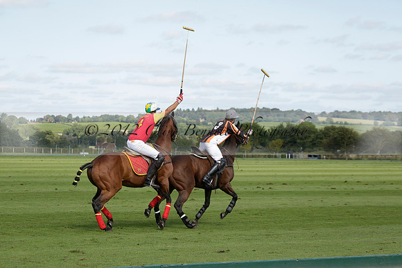 Four Quarters Black (black) v BHC (red) in a Autumn Cup polo match on Ambersham 2 at Cowdray Park Polo Club on Friday 20 September 2013 www.polopictures.co.uk