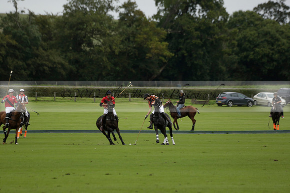 Four Quarters Black (black) v Clashleigh (red) in the Autumn Cup subsidiary final polo match on Ambersham 2 at Cowdray Park Polo Club on Sunday 22 September 2013 www.polopictures.co.uk