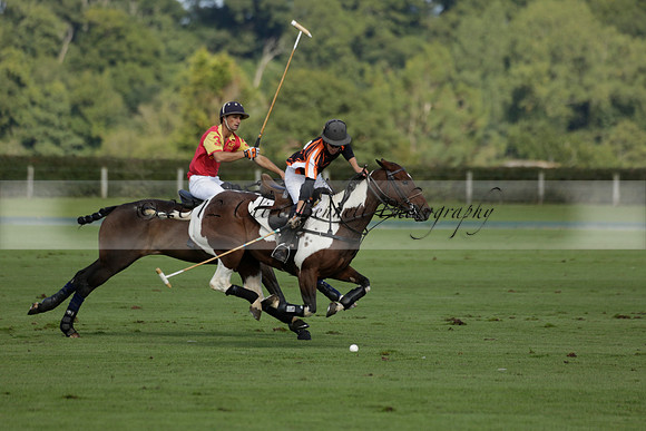 Four Quarters Black (black) v BHC (red) in a Autumn Cup polo match on Ambersham 2 at Cowdray Park Polo Club on Friday 20 September 2013 www.polopictures.co.uk