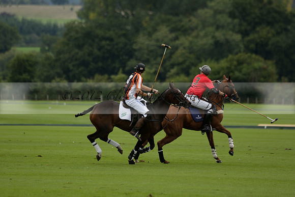 Four Quarters Black (black) v Clashleigh (red) in the Autumn Cup subsidiary final polo match on Ambersham 2 at Cowdray Park Polo Club on Sunday 22 September 2013 www.polopictures.co.uk