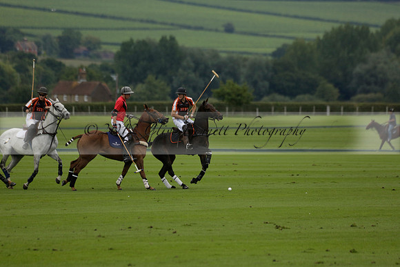 Four Quarters Black (black) v Clashleigh (red) in the Autumn Cup subsidiary final polo match on Ambersham 2 at Cowdray Park Polo Club on Sunday 22 September 2013 www.polopictures.co.uk