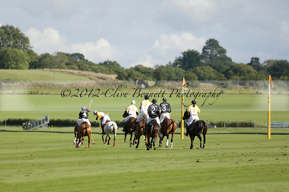Aryana (black) v Shoreline (yellow) in a Farewell Cup polo match played on Ambersham 5 at Cowdray Park Polo Club on Wednesday 18 September 2013. www.polopictures.co.uk