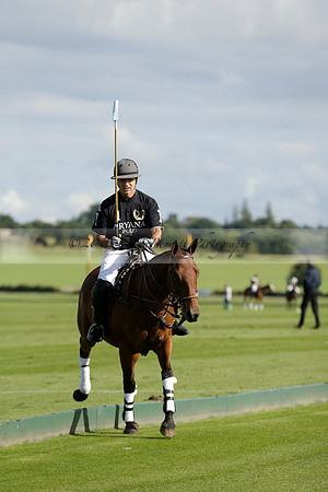 Aryana (black) v Shoreline (yellow) in a Farewell Cup polo match played on Ambersham 5 at Cowdray Park Polo Club on Wednesday 18 September 2013. www.polopictures.co.uk