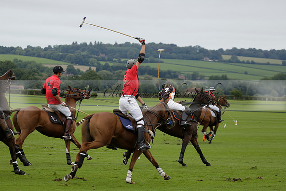 Four Quarters Black (black) v Clashleigh (red) in the Autumn Cup subsidiary final polo match on Ambersham 2 at Cowdray Park Polo Club on Sunday 22 September 2013 www.polopictures.co.uk