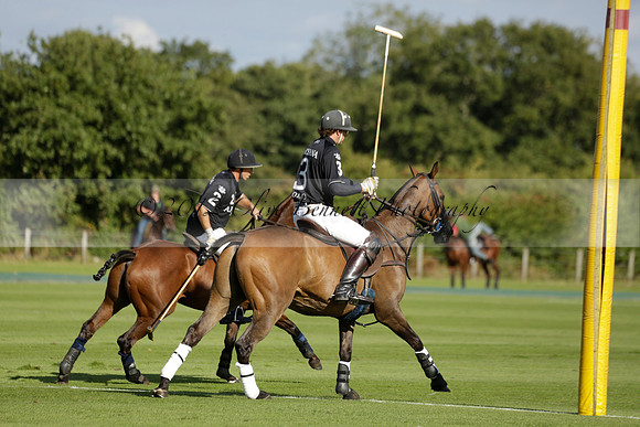 Aryana (black) v Shoreline (yellow) in a Farewell Cup polo match played on Ambersham 5 at Cowdray Park Polo Club on Wednesday 18 September 2013. www.polopictures.co.uk