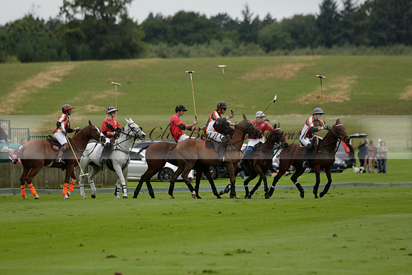 Four Quarters Black (black) v Clashleigh (red) in the Autumn Cup subsidiary final polo match on Ambersham 2 at Cowdray Park Polo Club on Sunday 22 September 2013 www.polopictures.co.uk