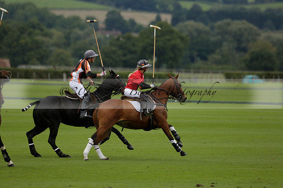 Four Quarters Black (black) v Clashleigh (red) in the Autumn Cup subsidiary final polo match on Ambersham 2 at Cowdray Park Polo Club on Sunday 22 September 2013 www.polopictures.co.uk