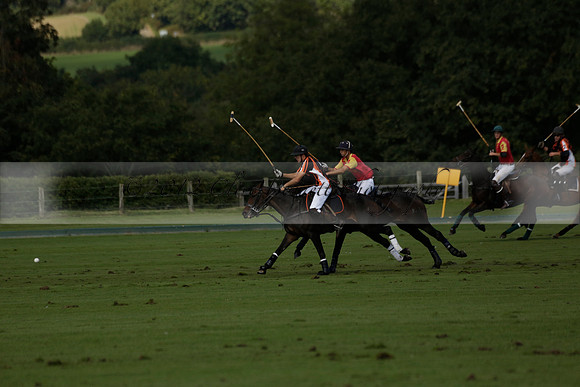 Four Quarters Black (black) v BHC (red) in a Autumn Cup polo match on Ambersham 2 at Cowdray Park Polo Club on Friday 20 September 2013 www.polopictures.co.uk