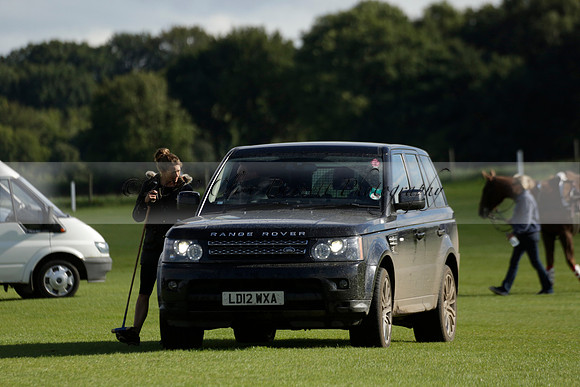 Aryana (black) v Shoreline (yellow) in a Farewell Cup polo match played on Ambersham 5 at Cowdray Park Polo Club on Wednesday 18 September 2013. www.polopictures.co.uk
