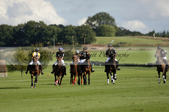 Aryana (black) v Shoreline (yellow) in a Farewell Cup polo match played on Ambersham 5 at Cowdray Park Polo Club on Wednesday 18 September 2013. www.polopictures.co.uk