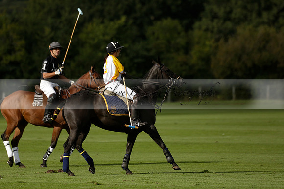 Aryana (black) v Shoreline (yellow) in a Farewell Cup polo match played on Ambersham 5 at Cowdray Park Polo Club on Wednesday 18 September 2013. www.polopictures.co.uk