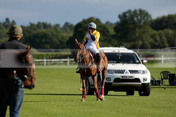 Aryana (black) v Shoreline (yellow) in a Farewell Cup polo match played on Ambersham 5 at Cowdray Park Polo Club on Wednesday 18 September 2013. www.polopictures.co.uk