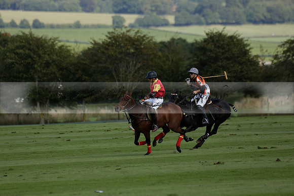 Four Quarters Black (black) v BHC (red) in a Autumn Cup polo match on Ambersham 2 at Cowdray Park Polo Club on Friday 20 September 2013 www.polopictures.co.uk