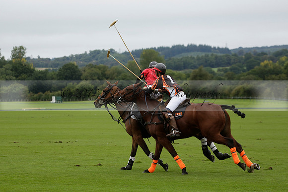Four Quarters Black (black) v Clashleigh (red) in the Autumn Cup subsidiary final polo match on Ambersham 2 at Cowdray Park Polo Club on Sunday 22 September 2013 www.polopictures.co.uk