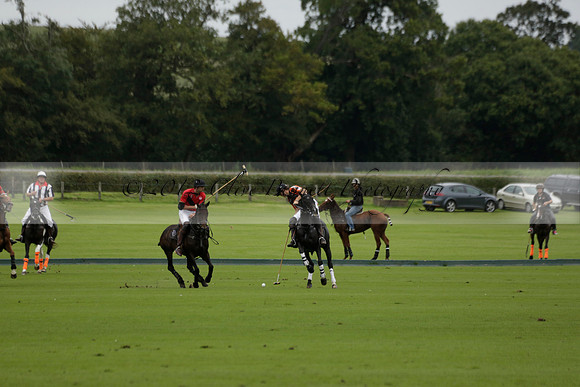 Four Quarters Black (black) v Clashleigh (red) in the Autumn Cup subsidiary final polo match on Ambersham 2 at Cowdray Park Polo Club on Sunday 22 September 2013 www.polopictures.co.uk