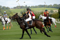 Four Quarters Black (black) v BHC (red) in a Autumn Cup polo match on Ambersham 2 at Cowdray Park Polo Club on Friday 20 September 2013 www.polopictures.co.uk