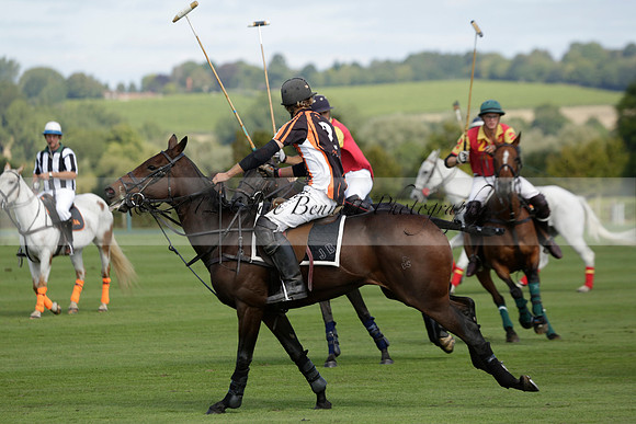 Four Quarters Black (black) v BHC (red) in a Autumn Cup polo match on Ambersham 2 at Cowdray Park Polo Club on Friday 20 September 2013 www.polopictures.co.uk