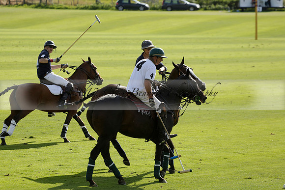 Pandas (white) v Home Farm (navy) in a Park House West Sussex Cup Polo match on Brooksfield at Cowdray Park Polo Club on Friday 30 August 2013. 2013.08.30 www.polopictures.co.uk