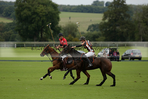Four Quarters Black (black) v Clashleigh (red) in the Autumn Cup subsidiary final polo match on Ambersham 2 at Cowdray Park Polo Club on Sunday 22 September 2013 www.polopictures.co.uk