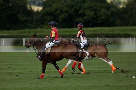 Four Quarters Black (black) v BHC (red) in a Autumn Cup polo match on Ambersham 2 at Cowdray Park Polo Club on Friday 20 September 2013 www.polopictures.co.uk