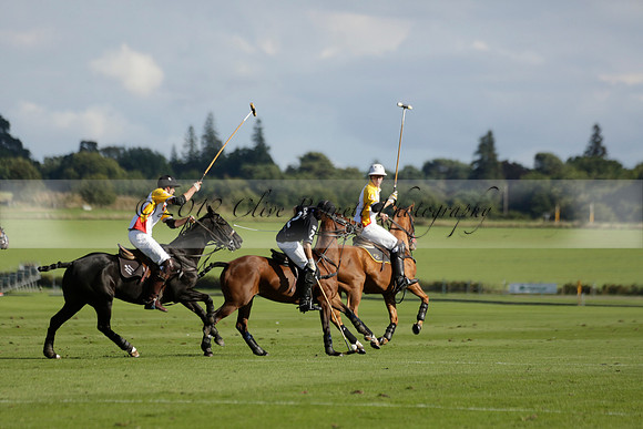 Aryana (black) v Shoreline (yellow) in a Farewell Cup polo match played on Ambersham 5 at Cowdray Park Polo Club on Wednesday 18 September 2013. www.polopictures.co.uk