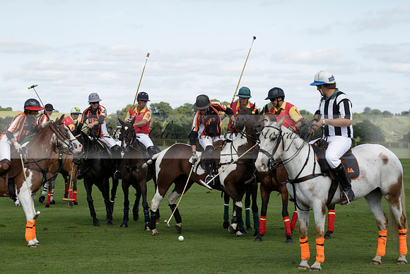 Four Quarters Black (black) v BHC (red) in a Autumn Cup polo match on Ambersham 2 at Cowdray Park Polo Club on Friday 20 September 2013 www.polopictures.co.uk