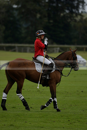 Four Quarters Black (black) v Clashleigh (red)in a Jaeger Le Coultre Autumn Cup polo match played on Ambersham 2 at Cowdray Park Polo Club on Wednesday 2013.09.11 www.polopictures.co.uk