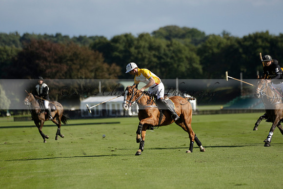 Aryana (black) v Shoreline (yellow) in a Farewell Cup polo match played on Ambersham 5 at Cowdray Park Polo Club on Wednesday 18 September 2013. www.polopictures.co.uk