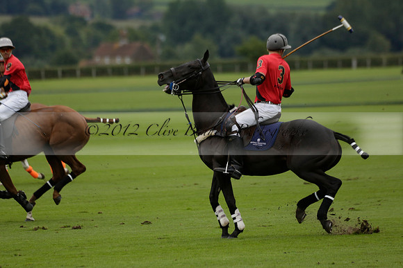 Four Quarters Black (black) v Clashleigh (red) in the Autumn Cup subsidiary final polo match on Ambersham 2 at Cowdray Park Polo Club on Sunday 22 September 2013 www.polopictures.co.uk