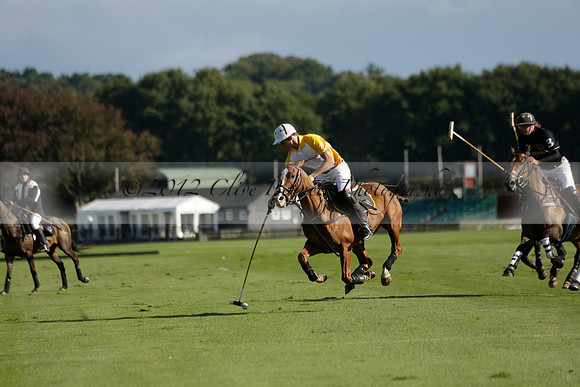 Aryana (black) v Shoreline (yellow) in a Farewell Cup polo match played on Ambersham 5 at Cowdray Park Polo Club on Wednesday 18 September 2013. www.polopictures.co.uk