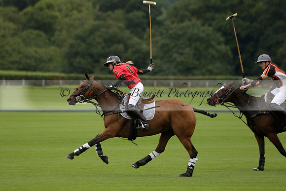Four Quarters Black (black) v Clashleigh (red) in the Autumn Cup subsidiary final polo match on Ambersham 2 at Cowdray Park Polo Club on Sunday 22 September 2013 www.polopictures.co.uk