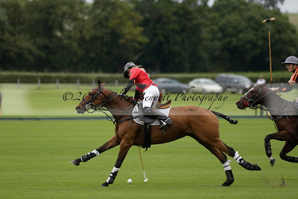 Four Quarters Black (black) v Clashleigh (red) in the Autumn Cup subsidiary final polo match on Ambersham 2 at Cowdray Park Polo Club on Sunday 22 September 2013 www.polopictures.co.uk